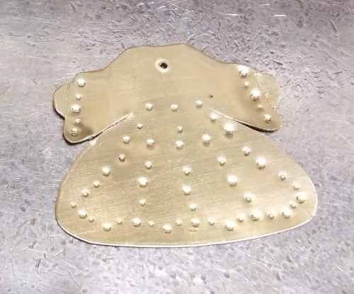 Judy Larson's Angel Ornament  - , Holiday Designs, Cutting, Cutting Tool, Cutters, Forging, Forging Jewelry, Jewelry Forging, How To Punch Holes, Hole Punching, Punch A Hole, Stamping, Stamps, Texturing, The Overskirt/Cape is decorated in the same manner.
